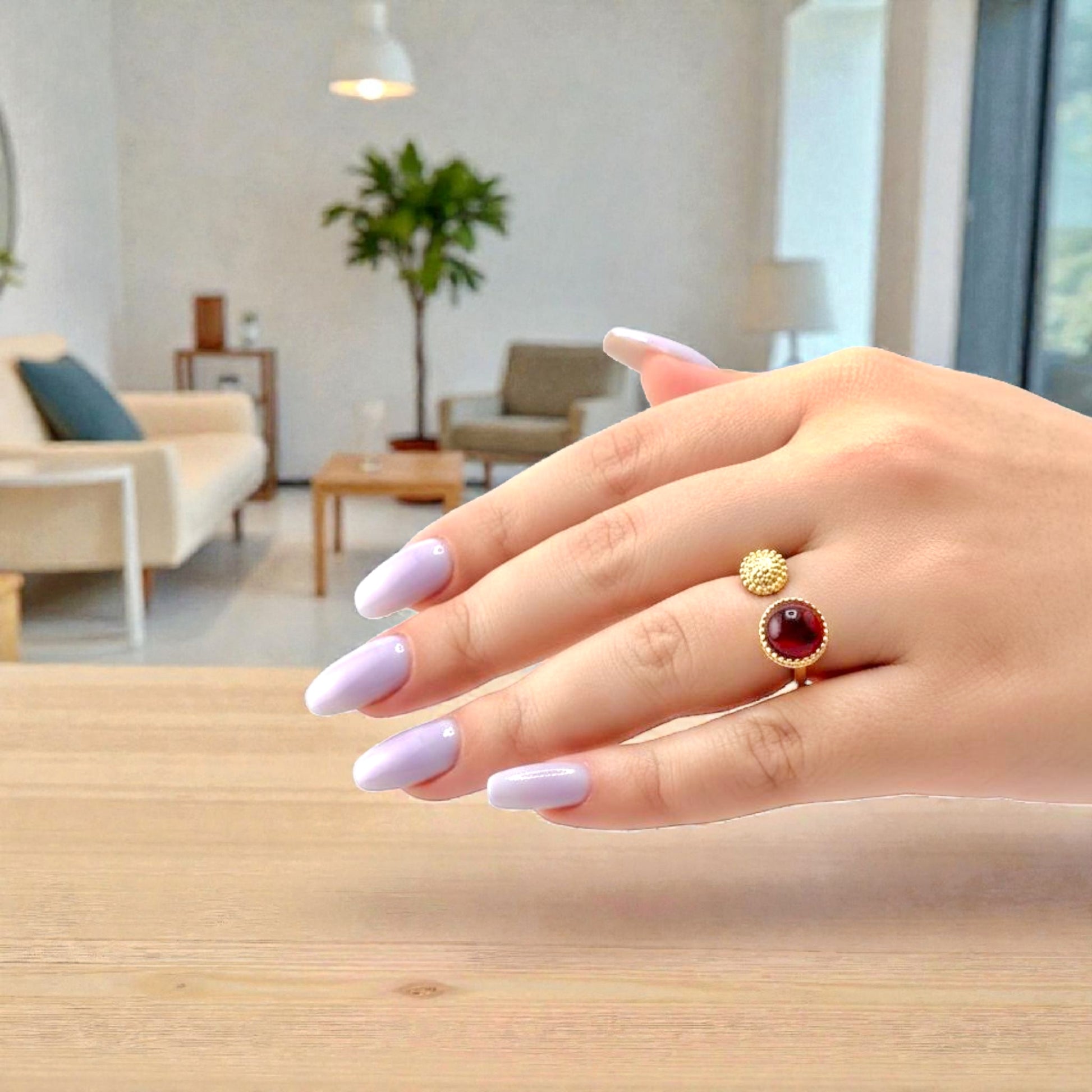 red garnet gemstone ring on display
