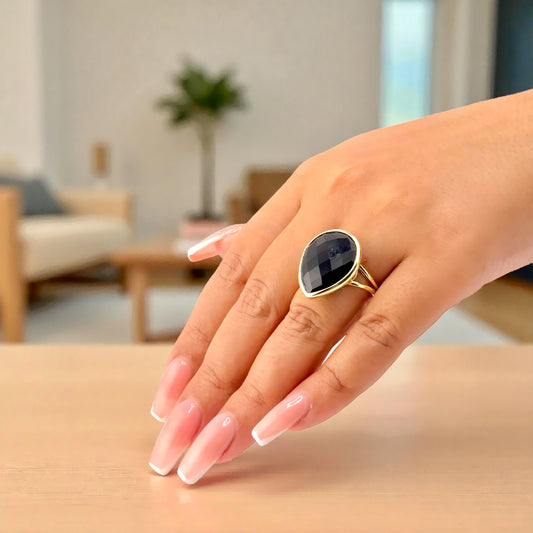 black onyx teardrop ring on hand