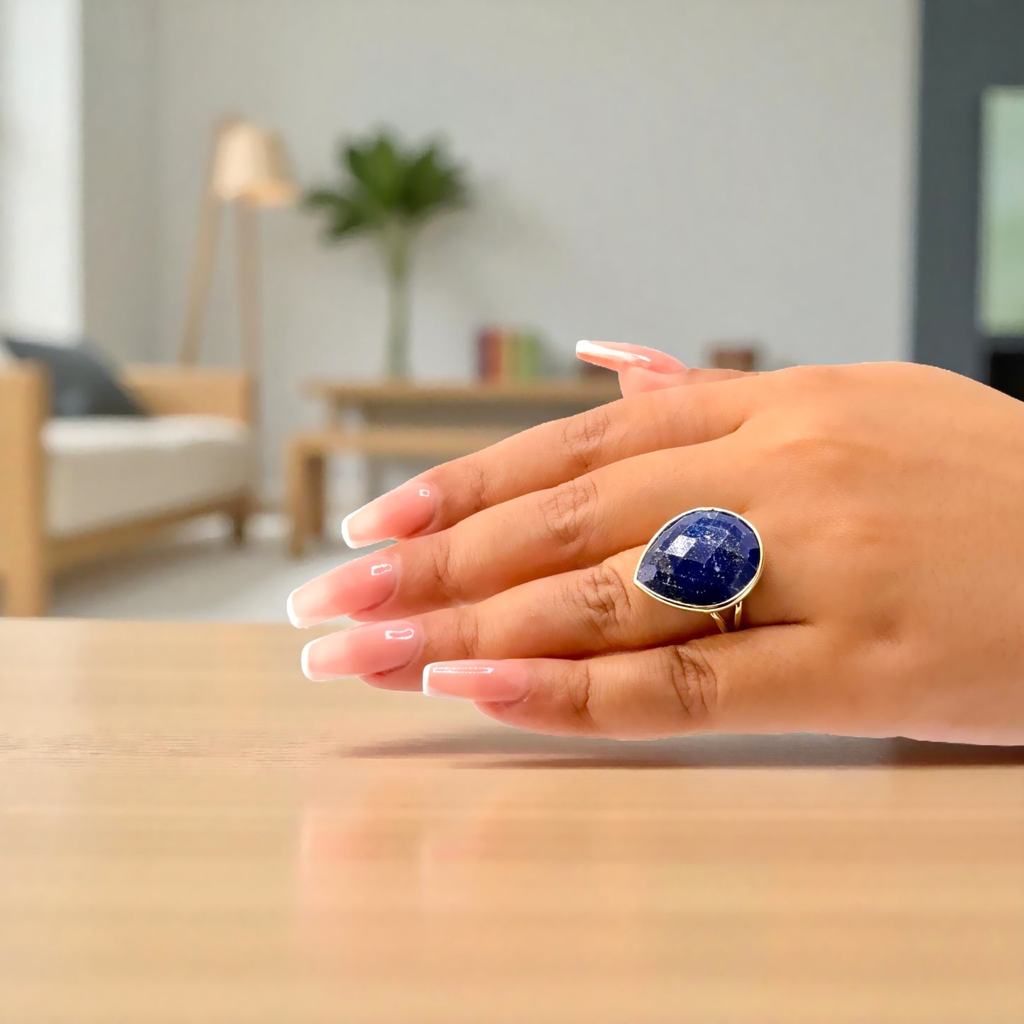 gold plated blue stone teardrop ring
