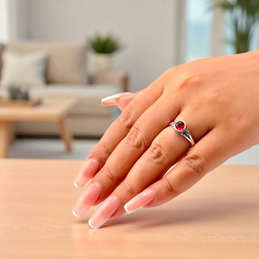 garnet ring on hand