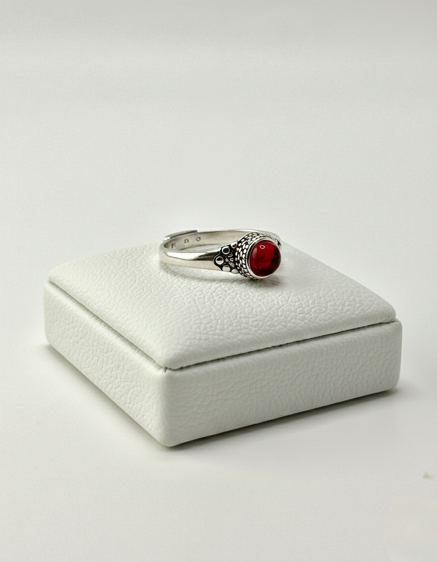 red stone gemstone ring close up