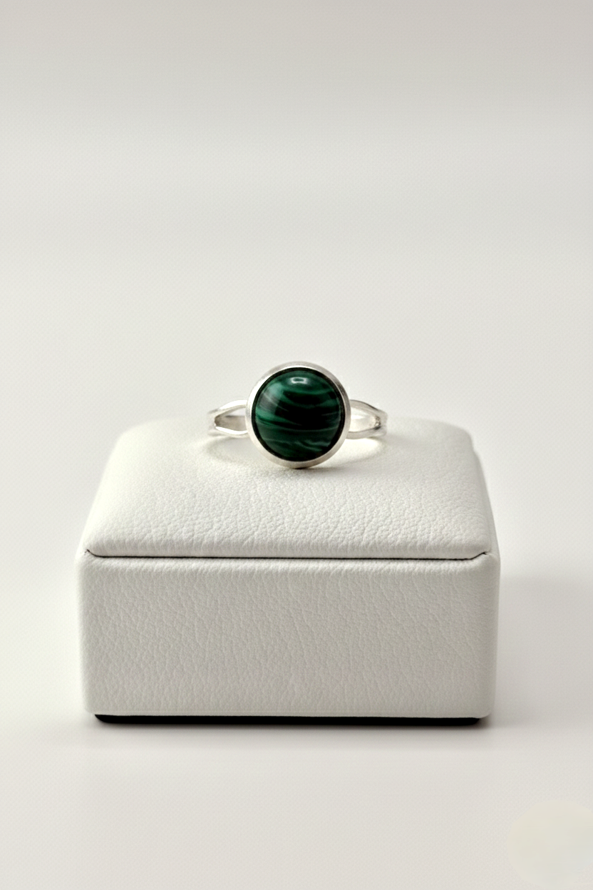 green banded stone ring close up