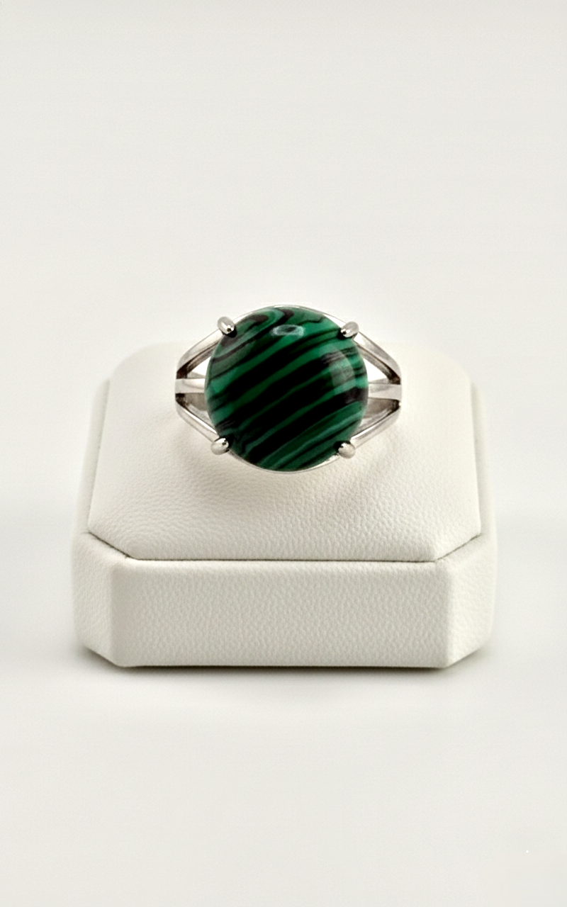 green banded stone ring close up