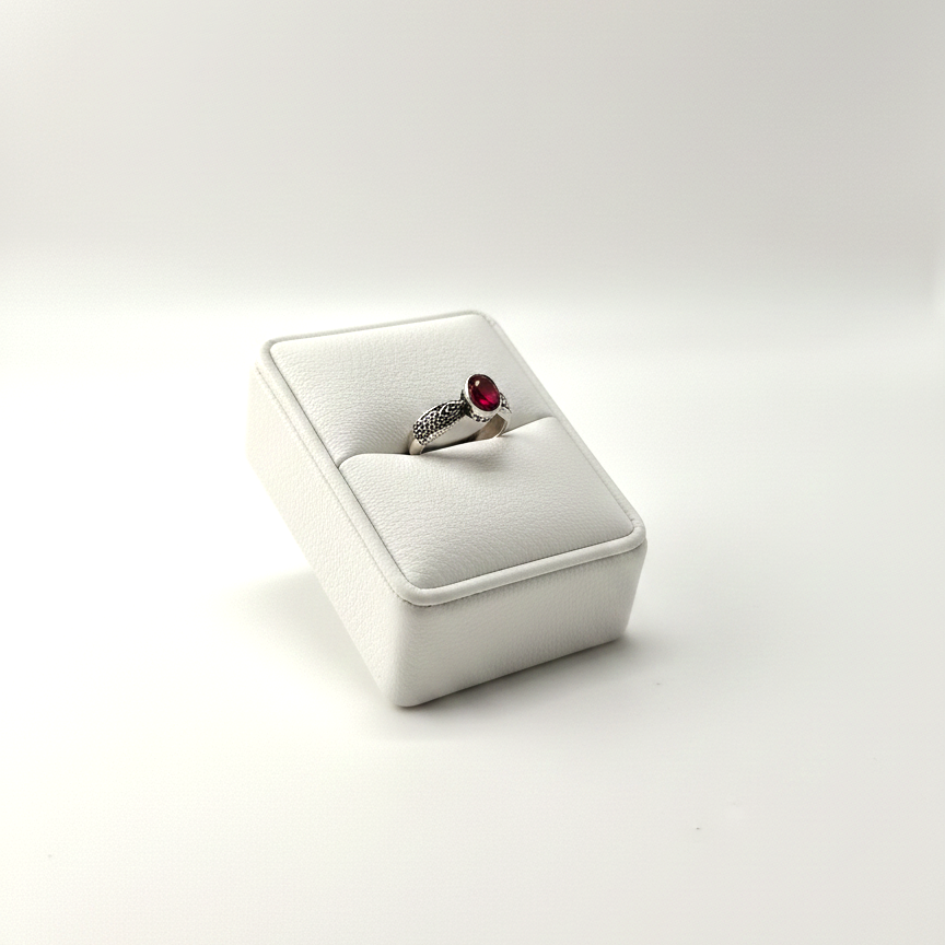 oval red gemstone ring close up