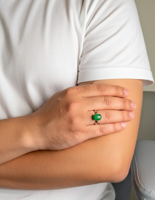 Close up of Green Aventurine gemstone ring on a man’s hand