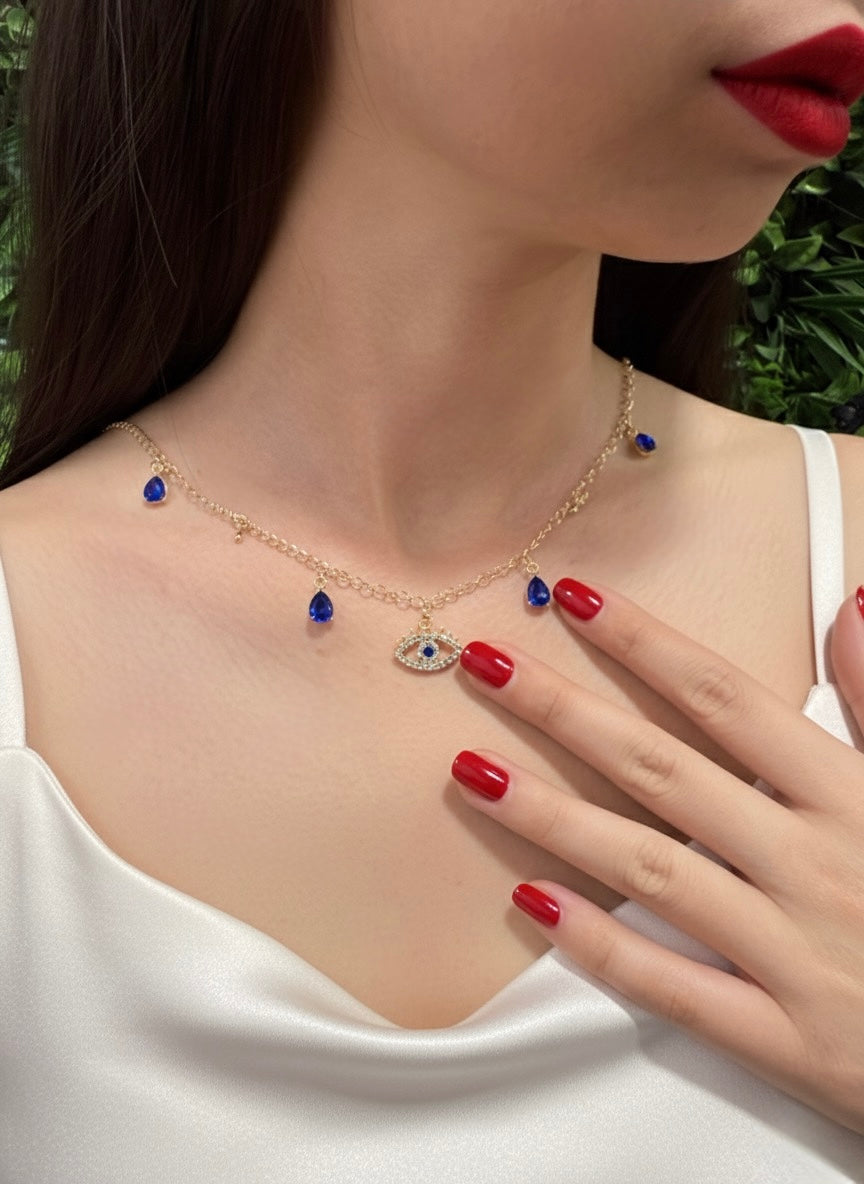 blue evil eye protection necklace displayed on model neckline