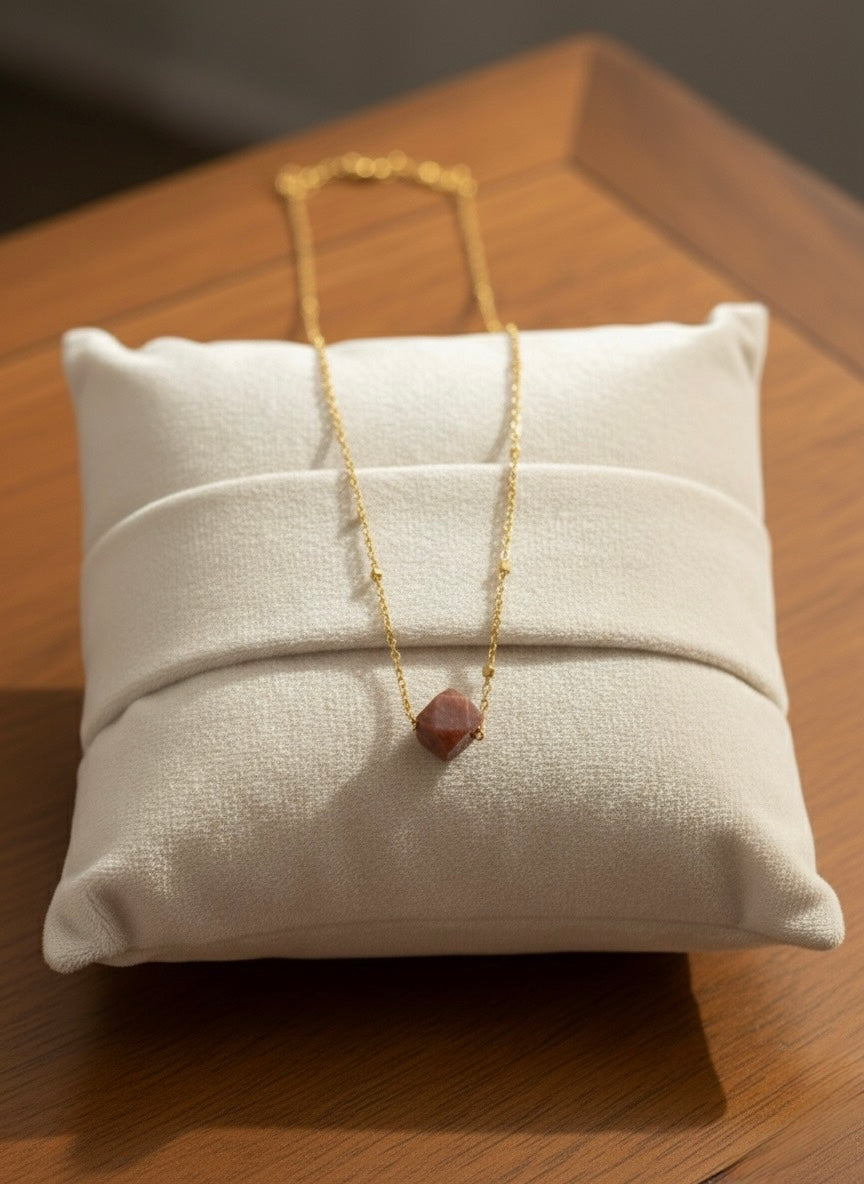 close up rhodonite cube necklace