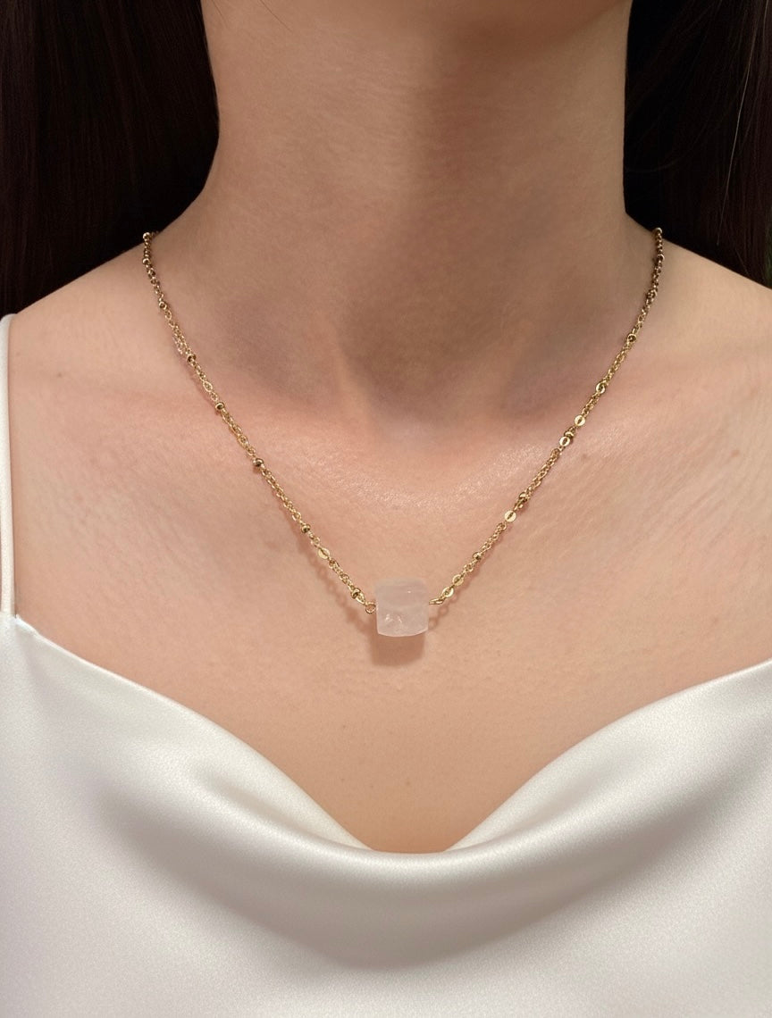 gold plated rose quartz cube pendant necklace on model
