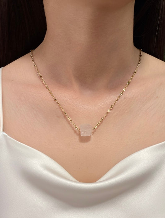 gold plated rose quartz cube pendant necklace on model