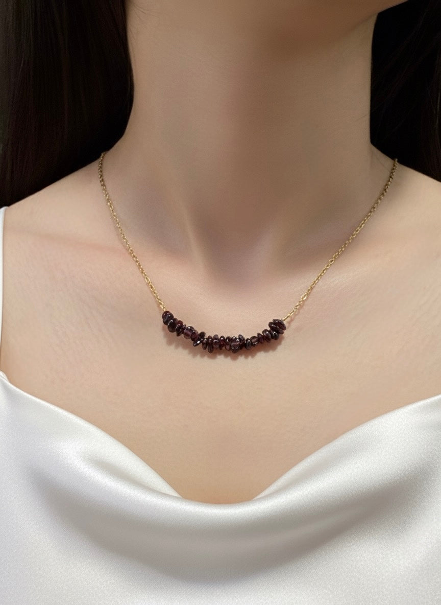 gold plated garnet crystal chip necklace on model