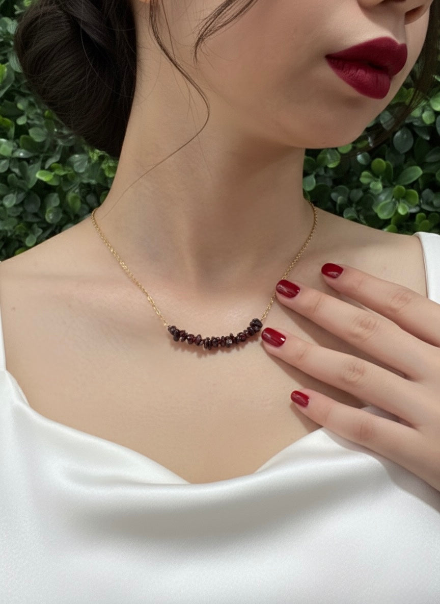 garnet crystal chip pendant on neckline