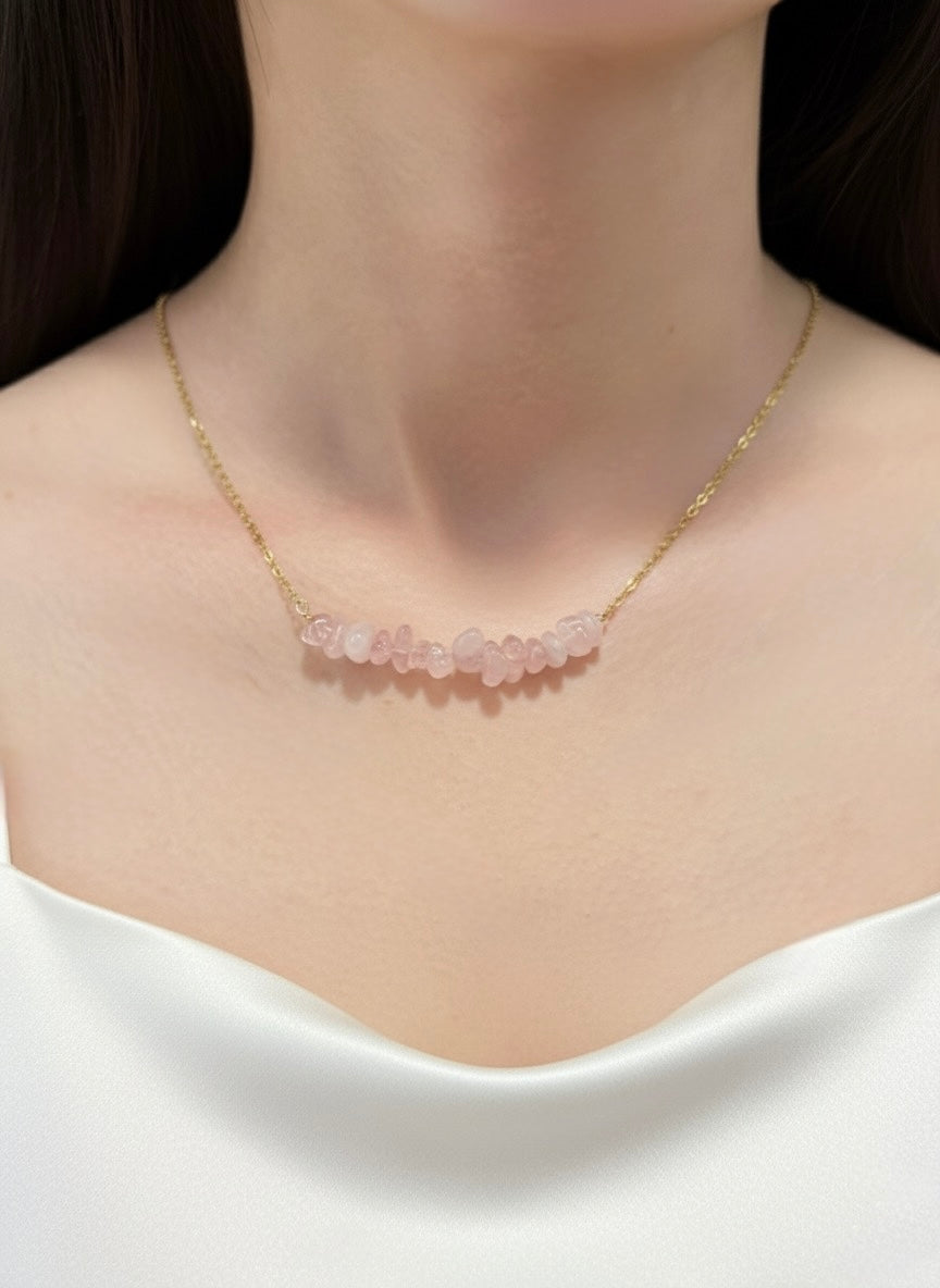 gold plated rose quartz crystal chip necklace on model