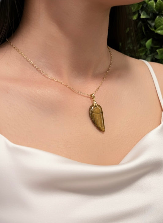 carved tiger eye angel wing pendant on gold chain