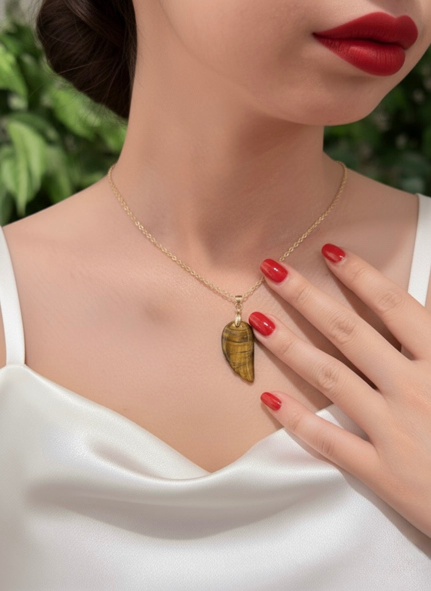 natural tiger eye angel wing necklace close up