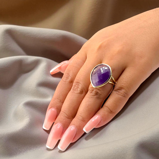 amethyst teardrop ring on hand