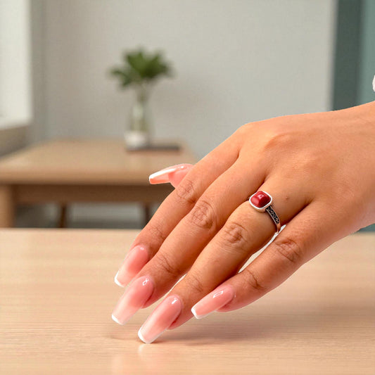 red jasper ring on hand