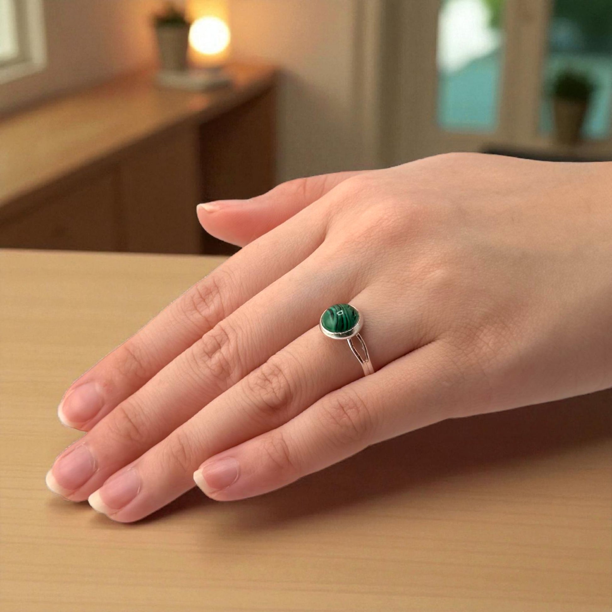 malachite ring on hand