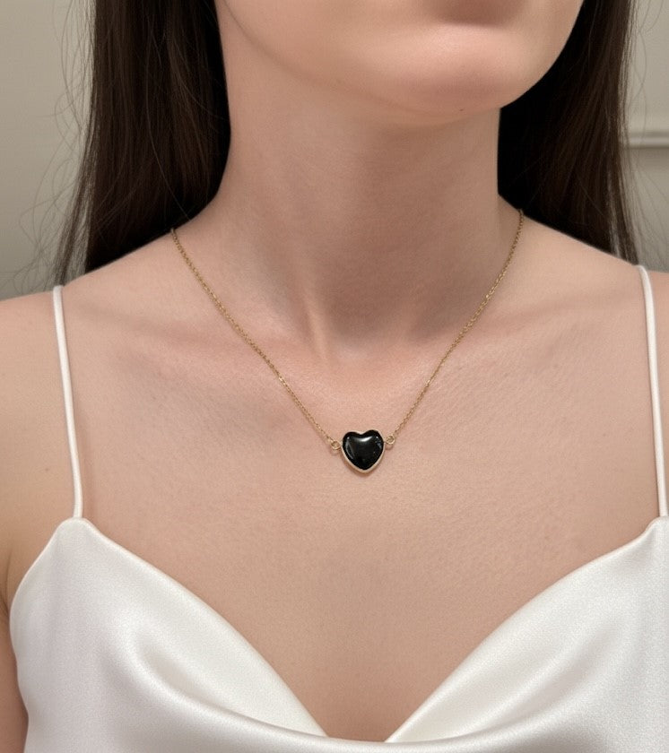 black obsidian heart necklace on model