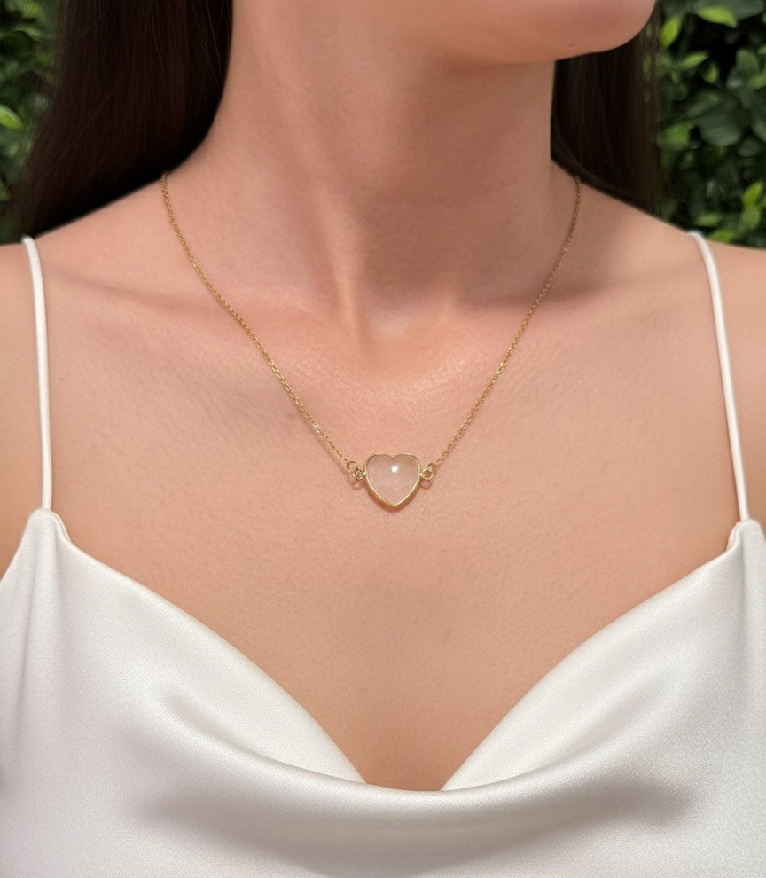 Rose quartz heart necklace on model