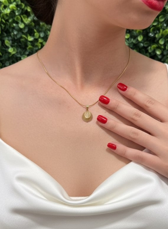 woman wearing sunburst opal necklace