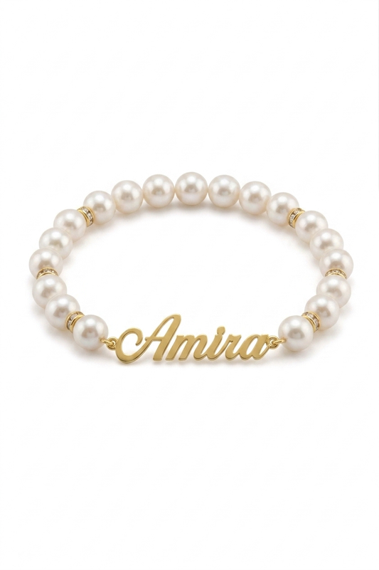 Pearl bracelet with gold accents and 'Amira' charm on a white background