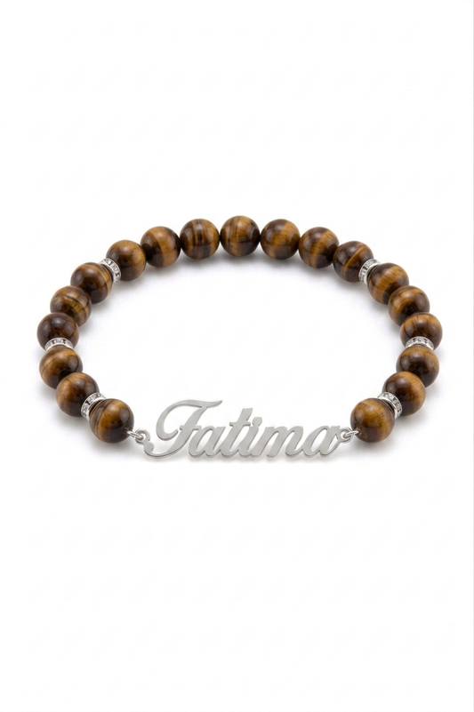 Wooden beaded bracelet with a silver 'Fatima' charm on a white background