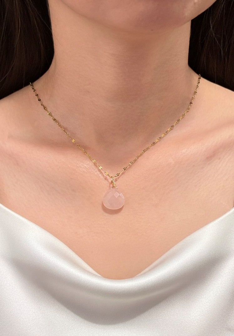 rose quartz faceted teardrop necklace on model