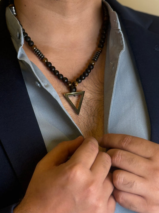 Black Matte Onyx Necklace with Triangle Pendant worn with blazer