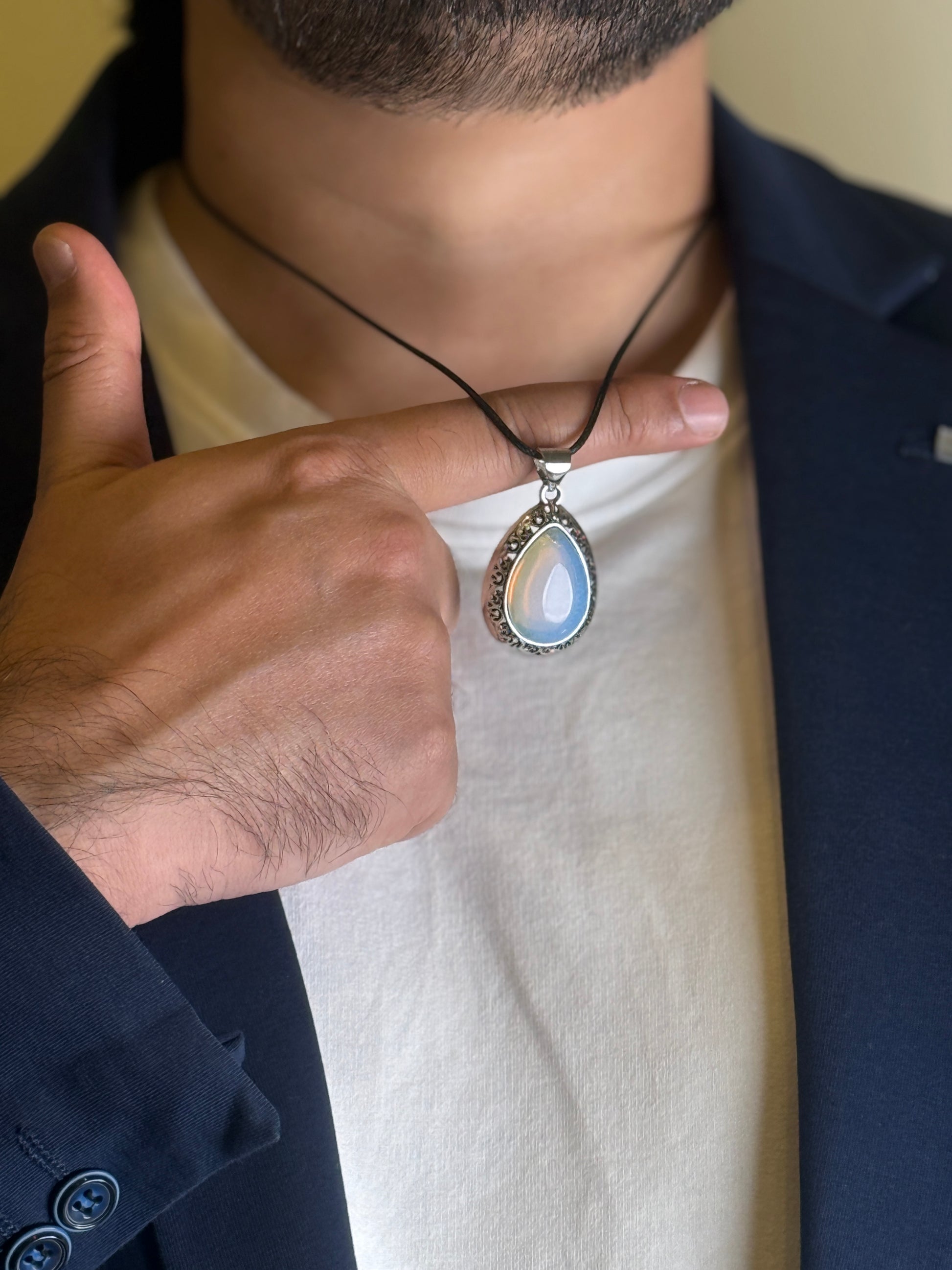 Moonstone pendant necklace pointing