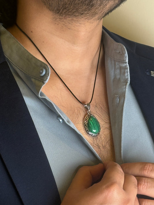 Malachite success pendant worn on chest