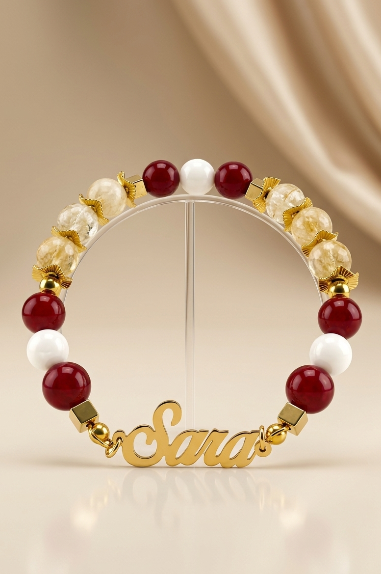 Bracelet with red, white, and gold beads on a beige background