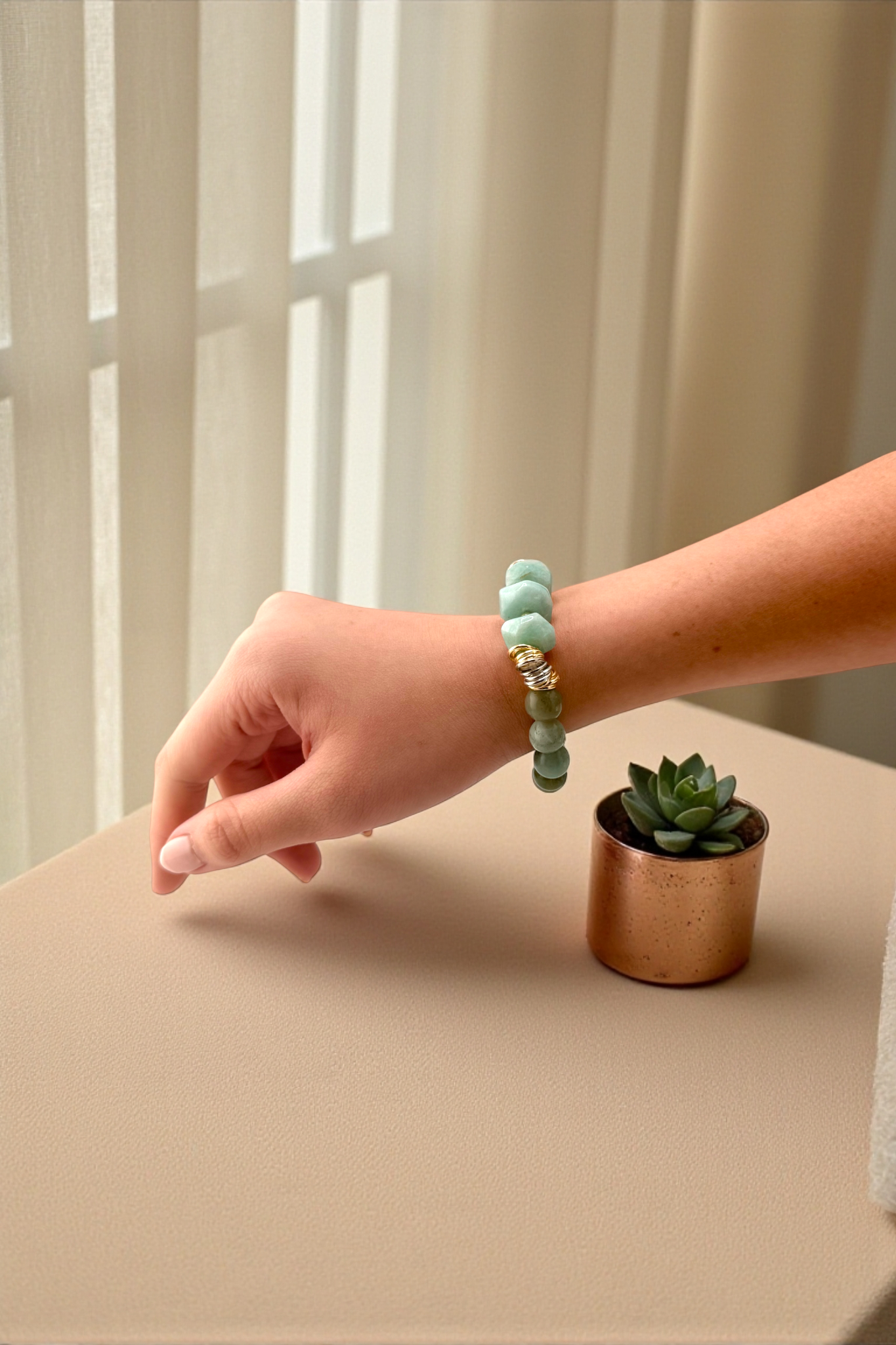 pastel stone bracelet with gold accents
