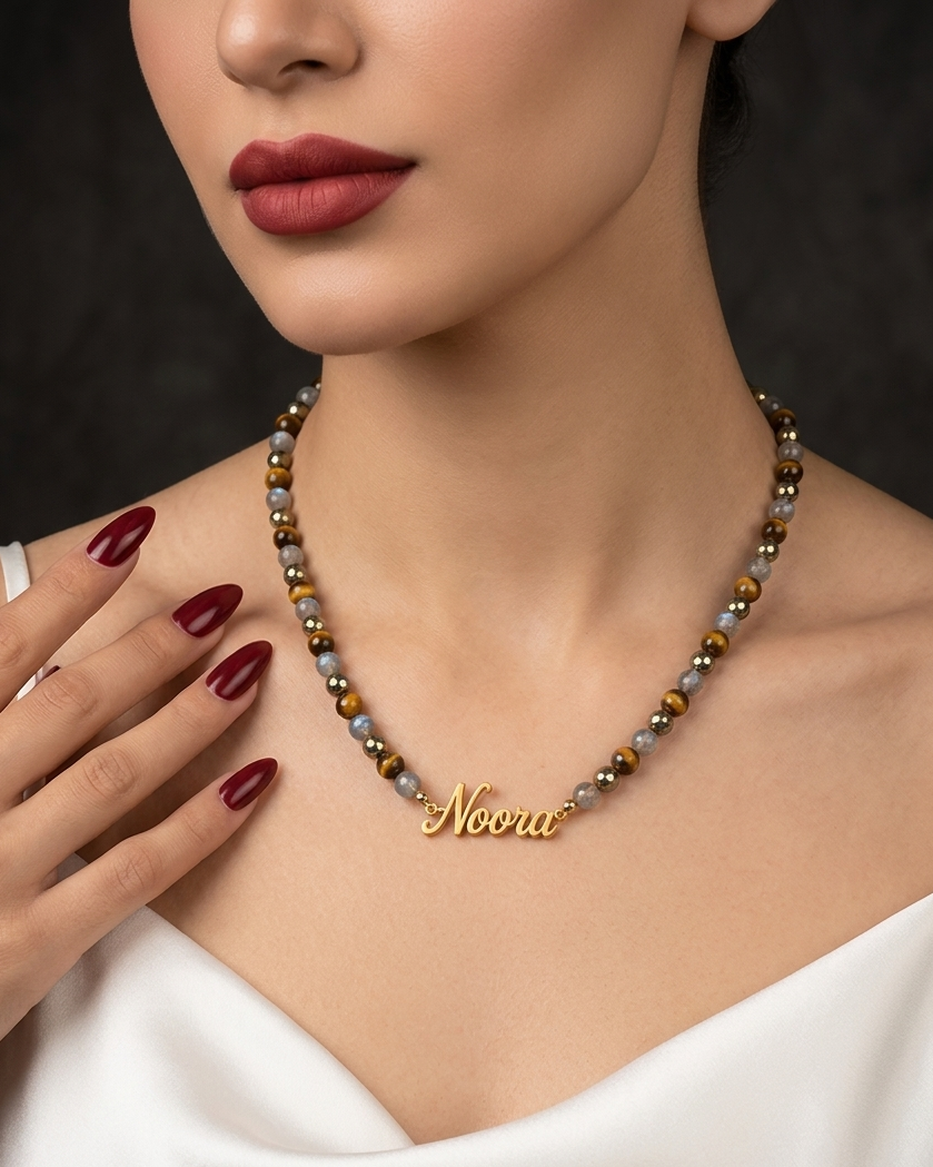 Necklace with 'Nova' pendant worn by a model against a dark background
