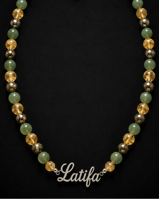 Necklace with multicolored beads on a black background