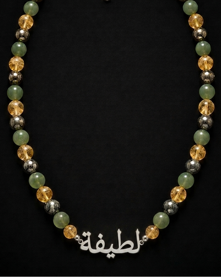 Necklace with multicolored beads on a black background