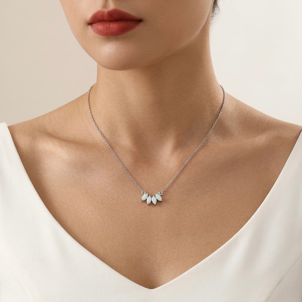 Necklace with a pendant on a model against a neutral background