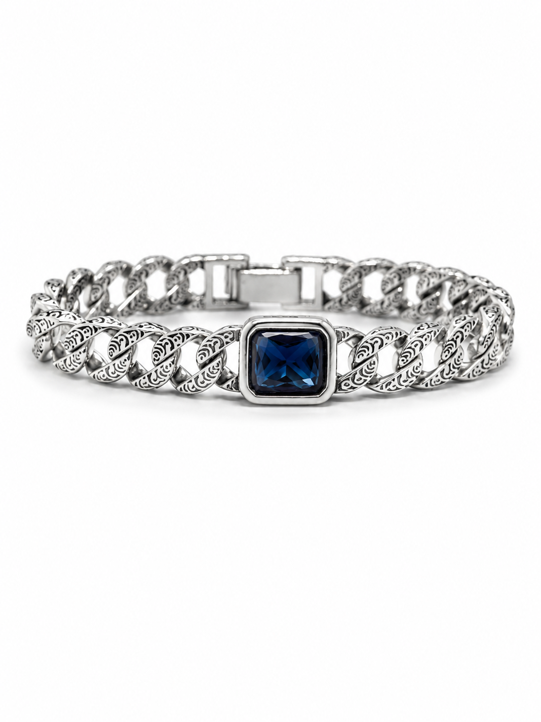 A silver-toned Cuban link chain bracelet featuring a central square bezel-set dark blue gemstone, shown against a plain white background.