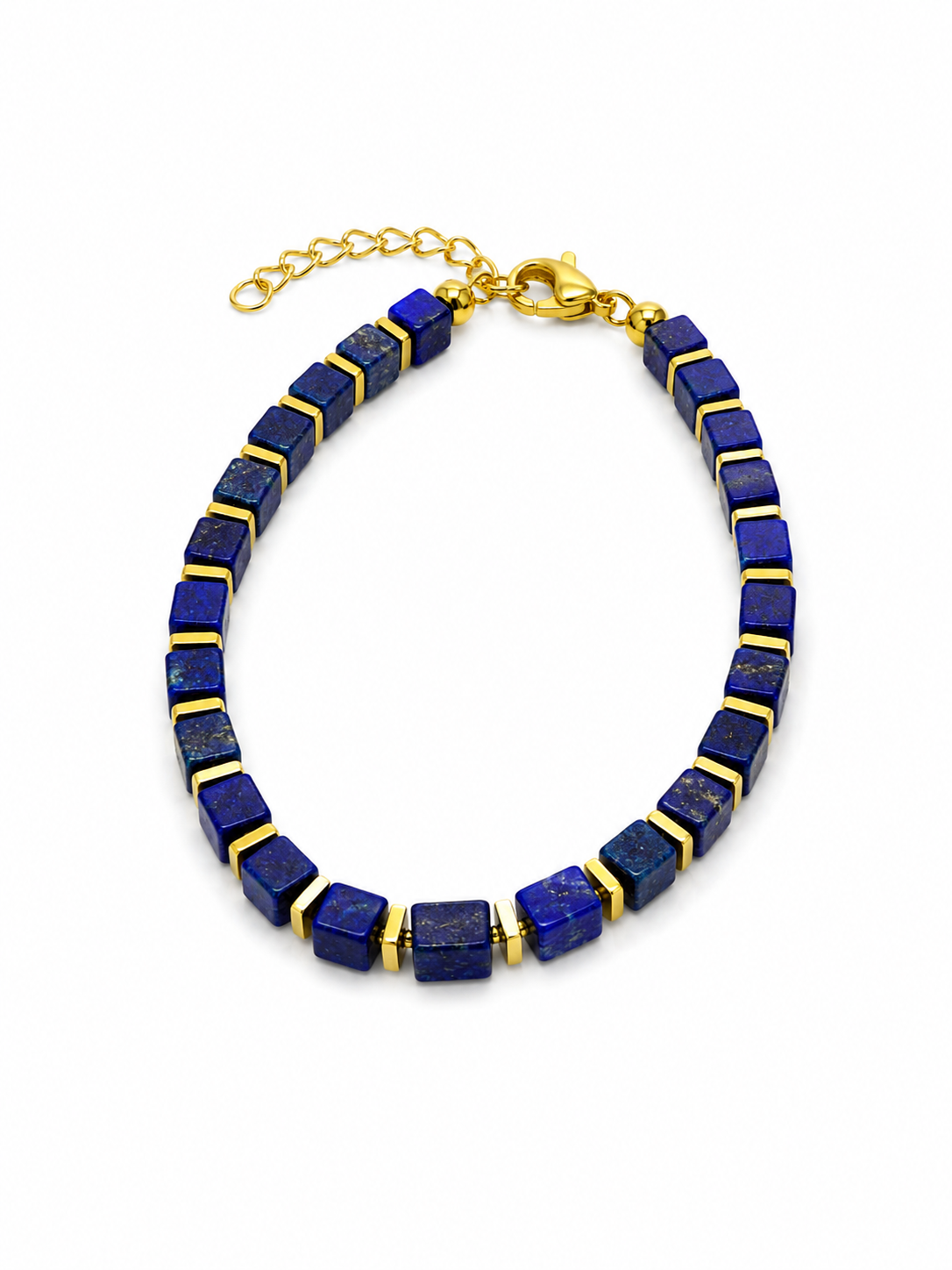 A gold and lapis lazuli bracelet featuring square-cut blue lapis lazuli stones set in gold, with a gold lobster clasp and extension chain, shown on a white background.
