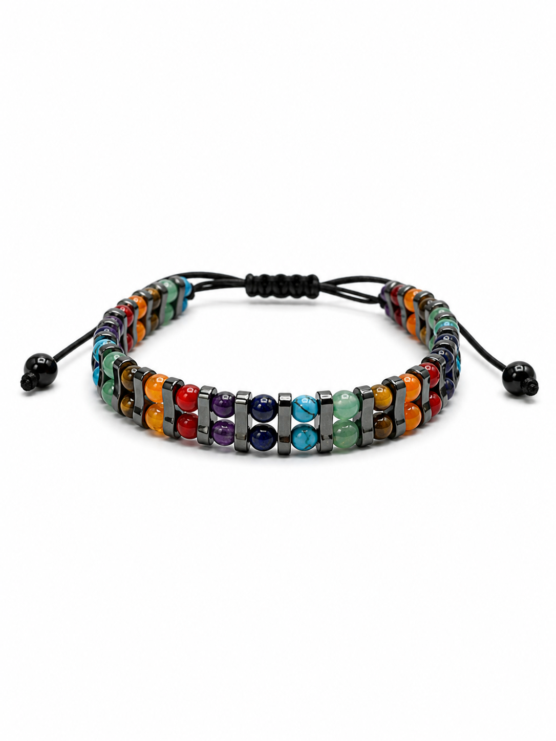 A multicolor beaded chakra bracelet with a black adjustable cord and black beads, displayed on a clean white background.