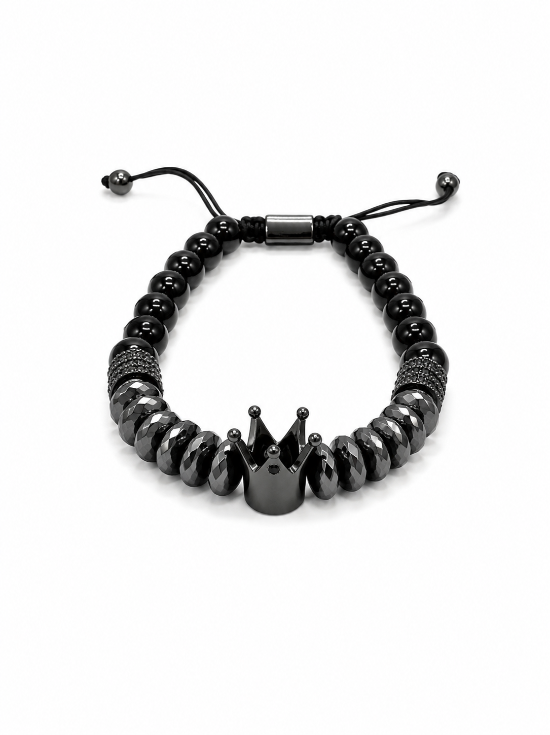 A black beaded bracelet featuring a central crown-shaped charm, textured spacer beads, and an adjustable sliding cord closure, shown on a plain white background.