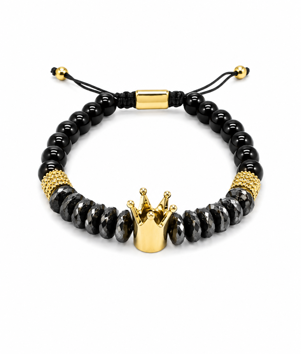 A beaded stretch bracelet featuring glossy black faceted beads, textured gold spacer rings, a small gold crown charm at the center, and an adjustable black cord with gold beads on a white background.