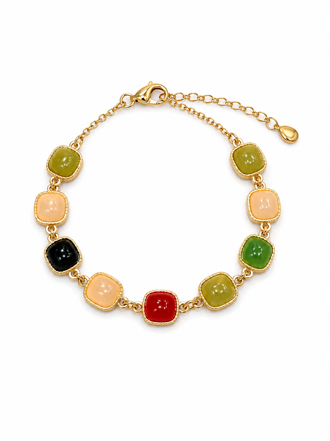 A gold chain bracelet featuring seven colorful, cushion-shaped faux stone charms in green, peach, black, and red, displayed on a clean white background.