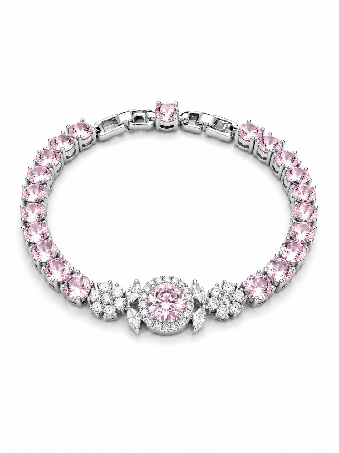 A silver-toned tennis bracelet featuring a row of round pink gemstones and a central floral cluster with a larger pink stone, set against a plain white background.