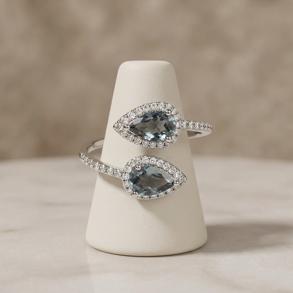Celestial Mist Blue Topaz Duo Ring featuring genuine natural Blue Topaz crystals in a silver-plated adjustable crossover setting.