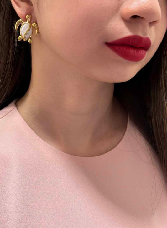 Golden Opal Turtle Stud Earrings – shimmering opal turtles that add a soft golden glow.