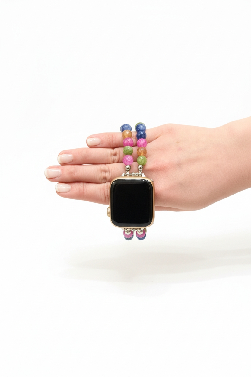 Smartwatch with a colorful beaded band held in a hand on a white background