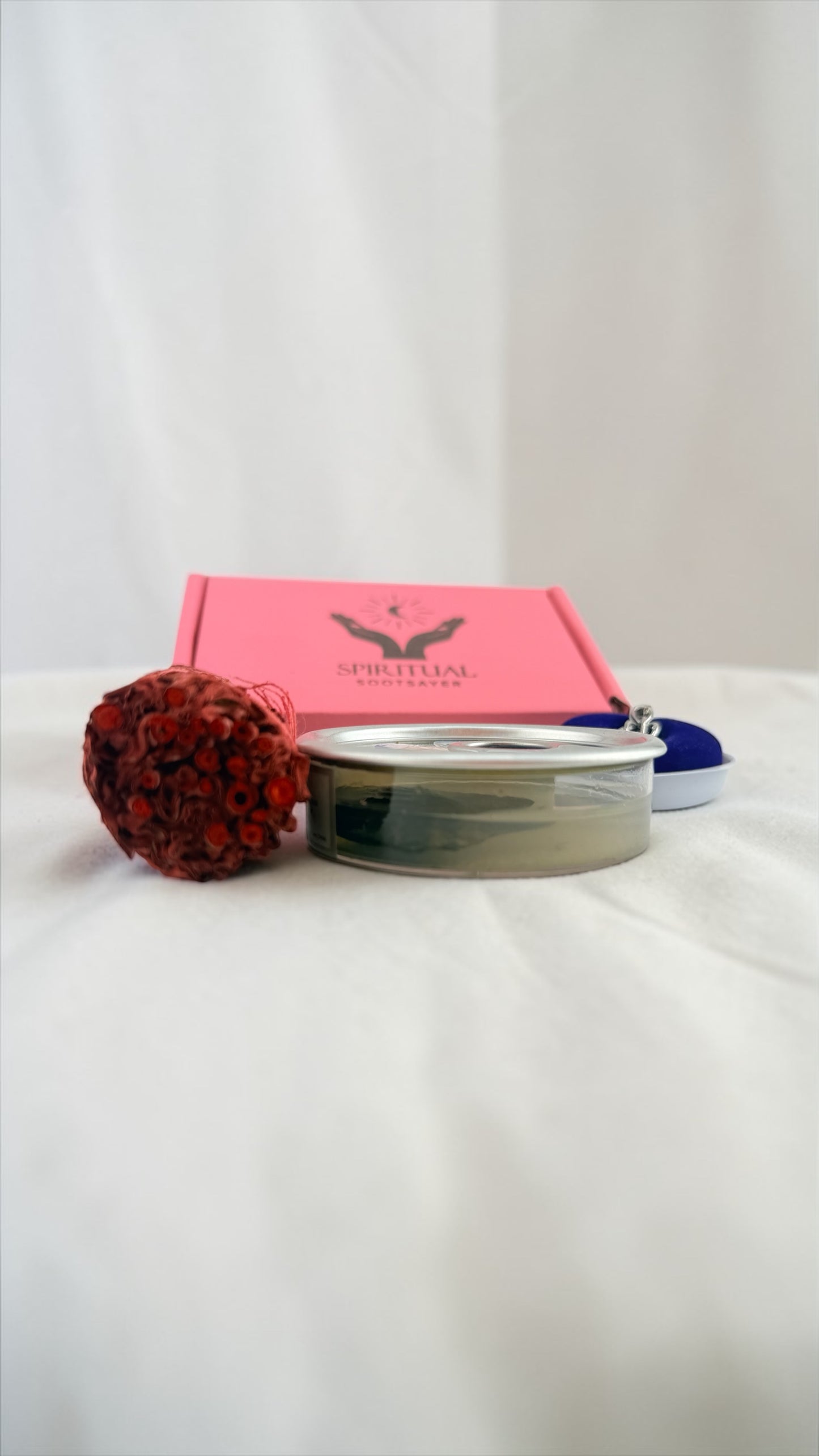 Cosmetic product with a pink box on a white background