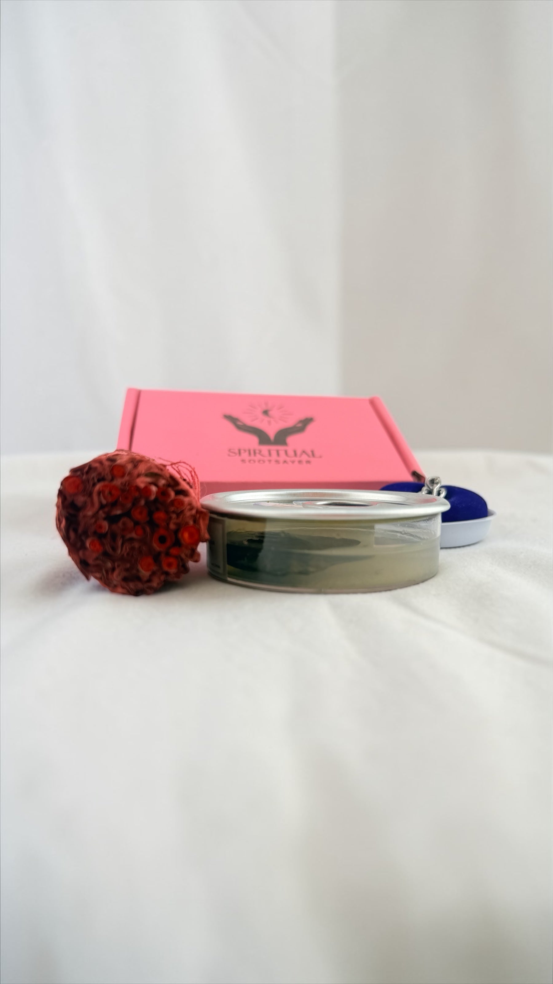 Cosmetic product with a pink box on a white background