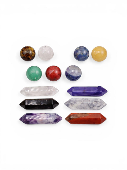 Set of crystal stones and wands on a white background
