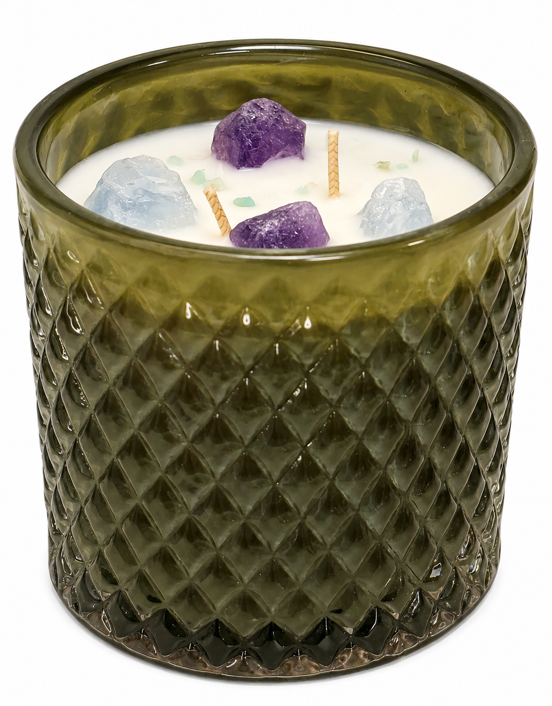 Green textured candle holder with a white candle featuring colorful rocks and candles inside.
